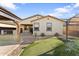 Spacious backyard featuring a putting green, desert landscaping, a covered patio, and a gazebo with a built-in grill at 20408 E Rosa Rd, Queen Creek, AZ 85142