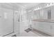 Luxurious bathroom with a glass-enclosed shower, a soaking tub, and double vanity sinks at 20408 E Rosa Rd, Queen Creek, AZ 85142