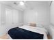 Cozy bedroom with white walls, stylish paneling, and a comfortable queen bed at 20408 E Rosa Rd, Queen Creek, AZ 85142