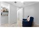 Comfortable bedroom with a spacious closet and cozy chair at 20408 E Rosa Rd, Queen Creek, AZ 85142