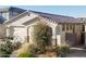 Inviting single-story home with a two-car garage, desert landscaping, and a covered front porch at 20408 E Rosa Rd, Queen Creek, AZ 85142