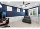 Bright office space featuring a large window, ceiling fan and neutral paint providing a calming environment at 20408 E Rosa Rd, Queen Creek, AZ 85142
