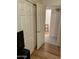 Bedroom with view of a large closet with doors and access to another room at 2120 E Daley Ln, Phoenix, AZ 85024