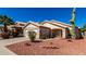 Charming single-story home with desert landscaping and spacious driveway at 2120 E Daley Ln, Phoenix, AZ 85024
