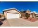 Charming single-story home with desert landscaping and a spacious driveway at 2120 E Daley Ln, Phoenix, AZ 85024