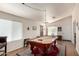 Well-lit game room features a classic pool table, hardwood flooring, and a neutral color palette at 2120 E Daley Ln, Phoenix, AZ 85024