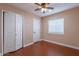 A bedroom with wood-look flooring at 2318 E Flower St, Phoenix, AZ 85016