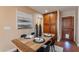Cozy dining area features a wooden table with seating for four and stylish decorative accents at 2318 E Flower St, Phoenix, AZ 85016