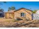 Charming home featuring a lattice-covered porch and a well-maintained yard at 2318 E Flower St, Phoenix, AZ 85016