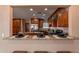 Gourmet kitchen featuring granite countertops, stainless steel appliances, and abundant cabinet space at 2318 E Flower St, Phoenix, AZ 85016