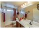 Bathroom featuring a vanity with matching cabinets, a sink, and a shower/tub combination at 2408 E Fiesta Dr, Casa Grande, AZ 85194