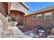 Cozy outdoor courtyard featuring tiled seating and a decorative water feature at 2408 E Fiesta Dr, Casa Grande, AZ 85194
