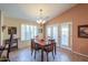 Bright dining room with vaulted ceiling and double doors, perfect for Gathering meals at 2408 E Fiesta Dr, Casa Grande, AZ 85194