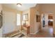 Welcoming foyer with decorative mirror, table and tiled flooring, leads to various living spaces at 2408 E Fiesta Dr, Casa Grande, AZ 85194