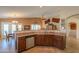 Spacious kitchen offering generous counter space and bar seating, perfect for casual dining at 2408 E Fiesta Dr, Casa Grande, AZ 85194