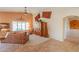 Comfortable living room with high ceilings, clerestory windows, and stylish decor at 2408 E Fiesta Dr, Casa Grande, AZ 85194
