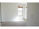 Bedroom with carpet, natural light, and neutral paint at 25564 W Magnolia St, Buckeye, AZ 85326