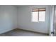 Bedroom with carpet, natural light, and neutral paint at 25564 W Magnolia St, Buckeye, AZ 85326