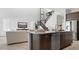 This modern kitchen features stainless steel appliances, plenty of cabinet space, and a functional island at 27272 N 74Th Ln, Peoria, AZ 85383