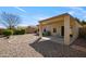 Private backyard with a covered patio and low-maintenance landscaping at 2910 W Allens Peak Dr, San Tan Valley, AZ 85144