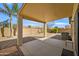 Inviting backyard with a covered patio and rock landscaping at 2910 W Allens Peak Dr, San Tan Valley, AZ 85144