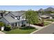Beautiful two-story home featuring manicured lawn, mature tree, and mountain views at 3226 E Sells Dr, Phoenix, AZ 85018