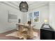Stylish home office with hardwood floors, a modern desk, and abundant natural light at 3226 E Sells Dr, Phoenix, AZ 85018