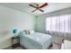 Bedroom with a ceiling fan and bright walls at 3702 W Megan St, Chandler, AZ 85226
