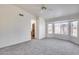 View of the bedroom featuring neutral carpet and a lovely bay window letting in natural light at 3702 W Megan St, Chandler, AZ 85226