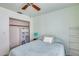 View of bright bedroom featuring ceiling fan, closet, and furniture at 3702 W Megan St, Chandler, AZ 85226