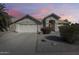 Charming single story home with desert landscaping, two car garage, and lovely curb appeal at 3702 W Megan St, Chandler, AZ 85226