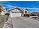 Beautiful one-story home with a two-car garage, desert landscaping, and covered front entry at 3702 W Megan St, Chandler, AZ 85226