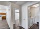 Hallway leading to laundry room, living area, and other rooms of the house at 3702 W Megan St, Chandler, AZ 85226