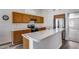 Kitchen featuring a large island with bar seating and stainless appliances at 3702 W Megan St, Chandler, AZ 85226