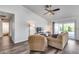 Open-concept living room featuring sliding glass doors at 3702 W Megan St, Chandler, AZ 85226