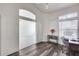 Home office with wood-look floors, workstation and French Doors at 3702 W Megan St, Chandler, AZ 85226