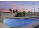 Sparkling pool surrounded by a concrete patio and block fence, perfect for outdoor relaxation and privacy at 3702 W Megan St, Chandler, AZ 85226