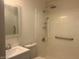 Bathroom with a shower and new vanity at 5518 E Lindstrom Ln # B3, Mesa, AZ 85215