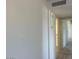Hallway with access to multiple rooms, neutral walls and flooring at 5518 E Lindstrom Ln # B3, Mesa, AZ 85215
