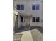 Inviting front entrance with neutral tones, well-maintained landscaping, and clear unit number at 600 S Dobson Rd # 175, Mesa, AZ 85202
