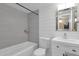Tastefully designed bathroom with modern vanity and storage, combined with a shower/tub combo at 623 W Guadalupe Rd # 131, Mesa, AZ 85210