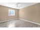Bedroom featuring light walls, tile flooring and a window at 623 W Guadalupe Rd # 131, Mesa, AZ 85210