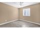 Bedroom featuring light walls, tile flooring and a window at 623 W Guadalupe Rd # 131, Mesa, AZ 85210