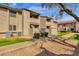 An exterior view of a condo featuring two floors, and stairs at 623 W Guadalupe Rd # 131, Mesa, AZ 85210