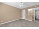 Cozy living room space with a view into the updated bathroom, offering convenience and style at 623 W Guadalupe Rd # 131, Mesa, AZ 85210
