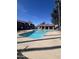 Sparkling community pool with lounge chairs and nearby clubhouse, perfect for relaxing on a sunny day at 623 W Guadalupe Rd # 131, Mesa, AZ 85210
