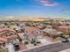 A well-maintained neighborhood provides stunning views of mountains and beautiful landscaping at 647 E Palomino Way, San Tan Valley, AZ 85143