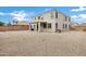 Backyard featuring a low maintenance landscape, stucco exterior, and covered patio at 647 E Palomino Way, San Tan Valley, AZ 85143