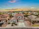 Beautiful two-story home with desert landscaping, tile roof, and an attached two-car garage at 647 E Palomino Way, San Tan Valley, AZ 85143