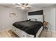 Cozy bedroom featuring a ceiling fan and neutral walls at 7546 E Clovis Cir, Mesa, AZ 85208
